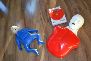 Adult and infant training mannequins and AED trainer